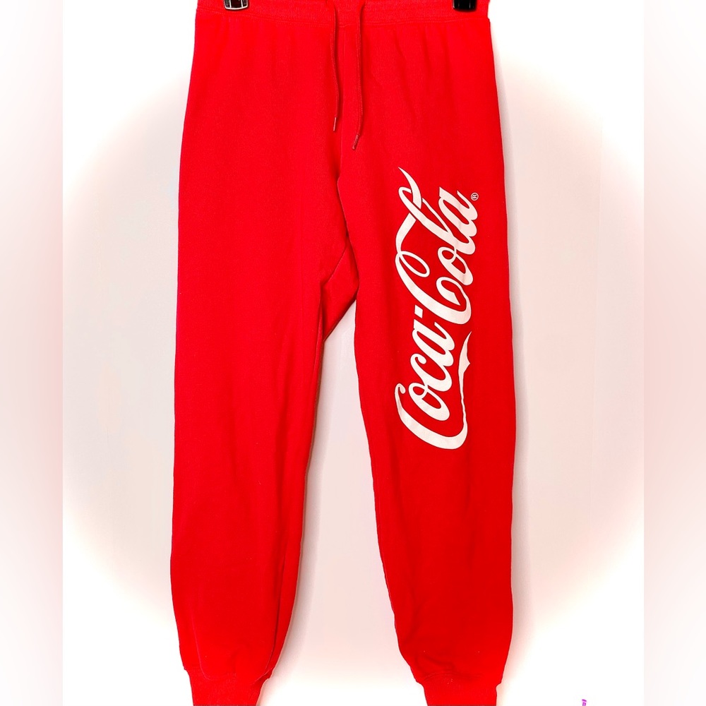 Excellent condition Coca-Cola joggers. Size is XS, 60% Cotton, 40% Polyester.